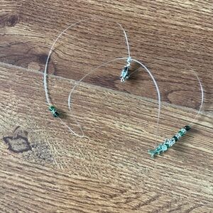 Handmade green glass beads and stickman charm clear necklace
